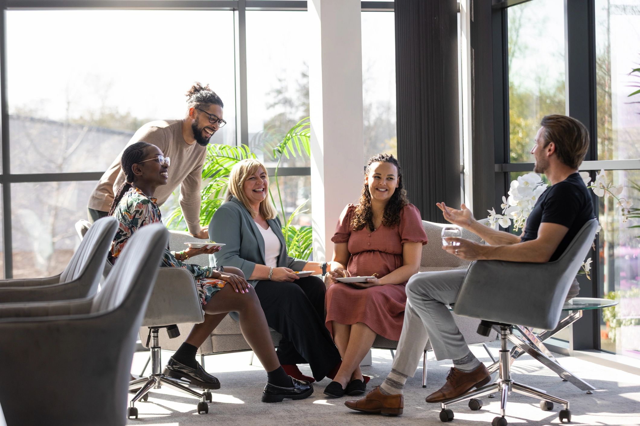 Business coaching clients in a collaborative meeting